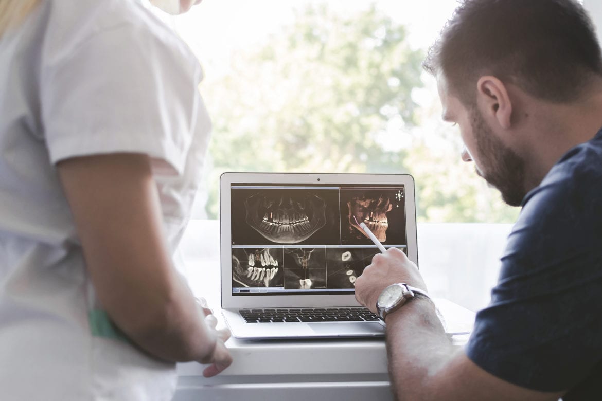 dentists reveiwing x-ray image - eds blog - the daily tooth