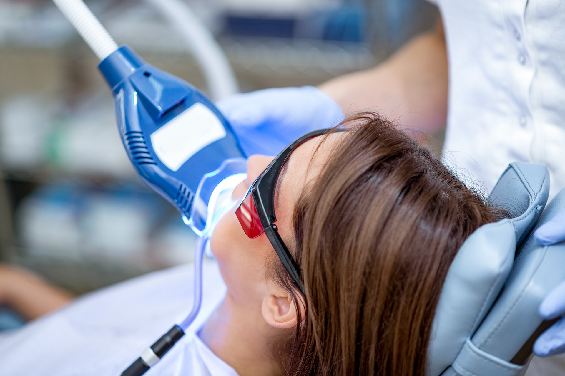 woman in dentist chair teeth whitening eds emergency dental service