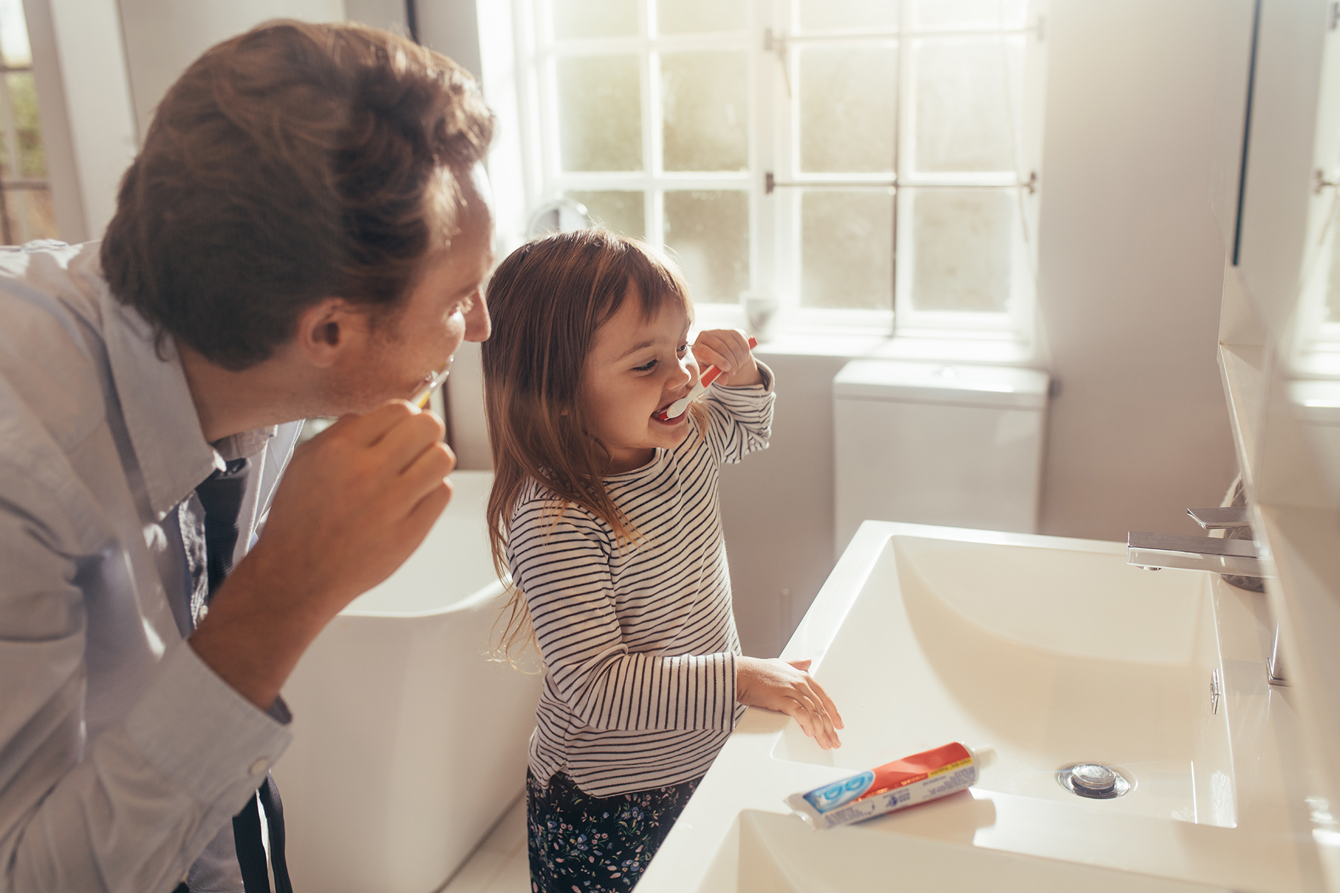 growing child brushing teeth emergency dental service blog