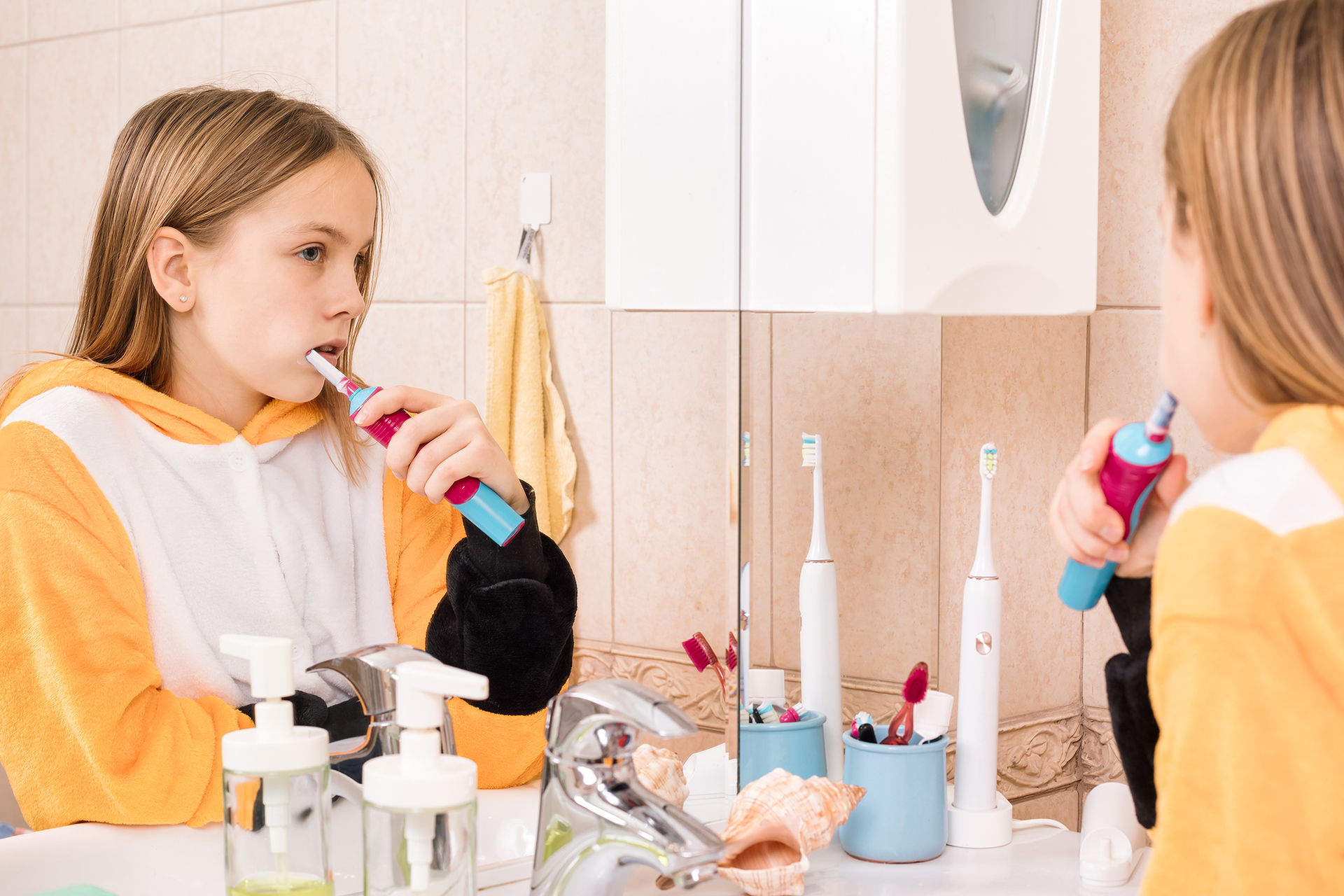 Little girl brushing her teeth