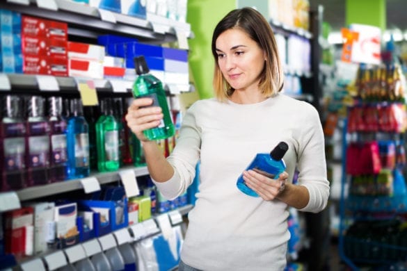 woman shopping for mouthwash