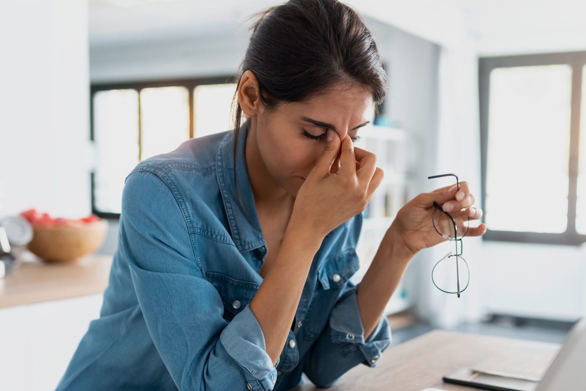 Woman experiencing pain due to tooth loss