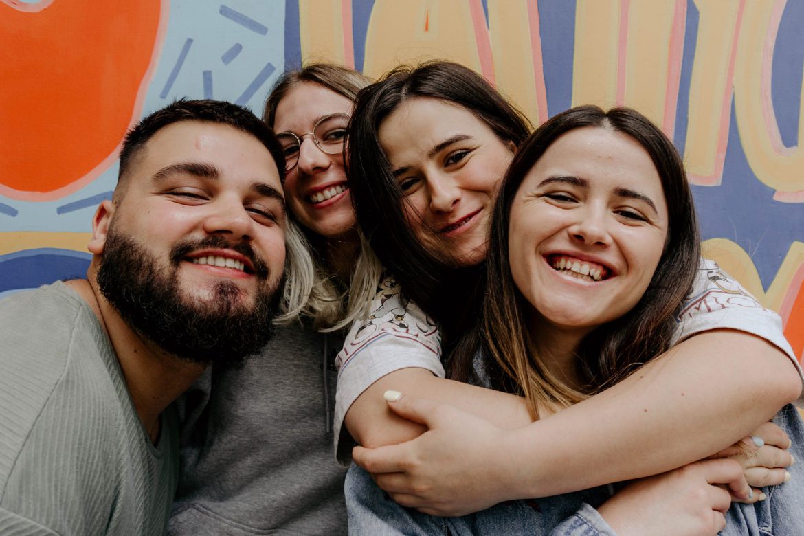 Family together, smiling