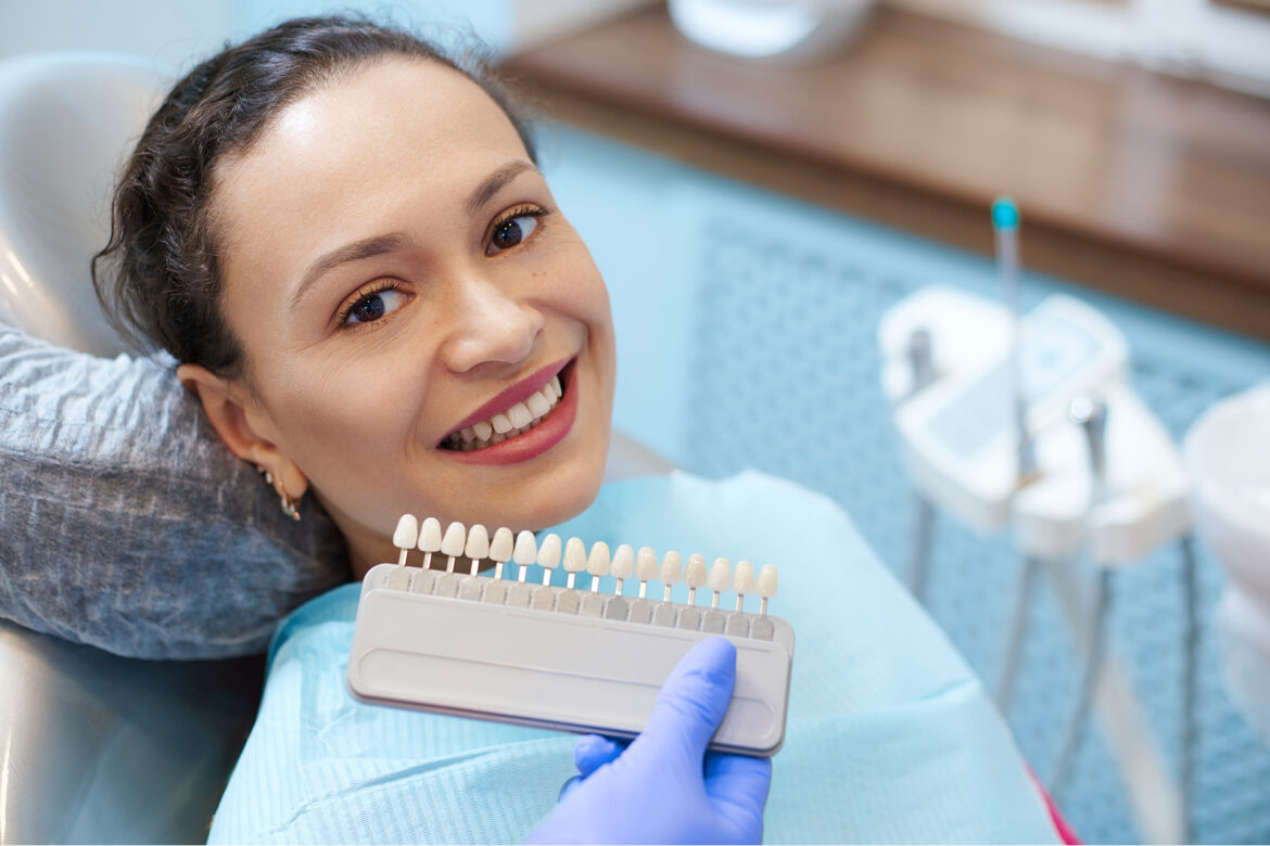 blog-eds-dangersofbadveneers woman at costmetic dentist appointment